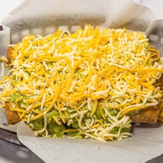 15. Three Big Rolled Tacos Combo