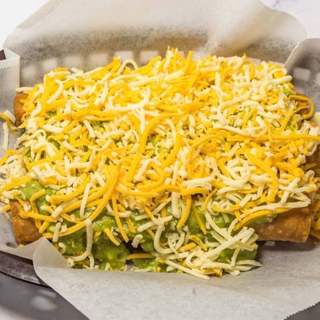 15. Three Big Rolled Tacos Combo.